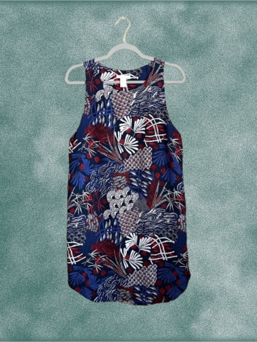 Abstract patterned H&M dress w/ rounded hem sz 10